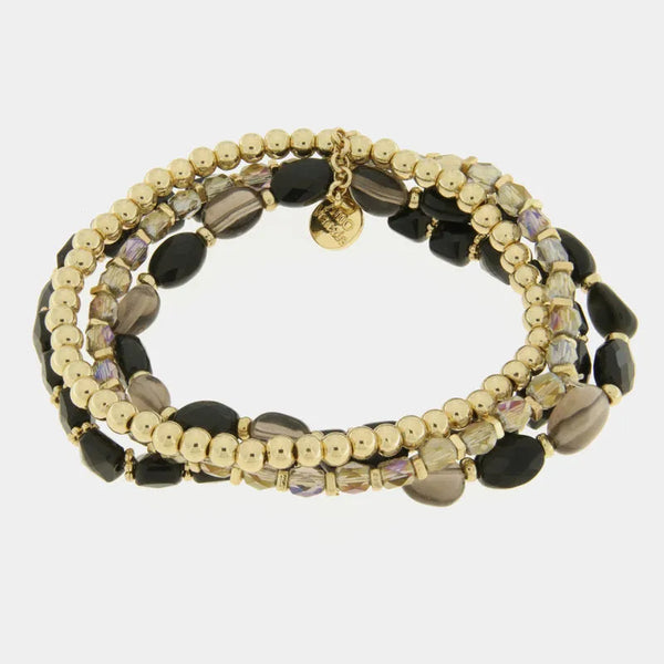 Bracciale in Metallo multifilo con perline oro e pietre nere — collezione burano