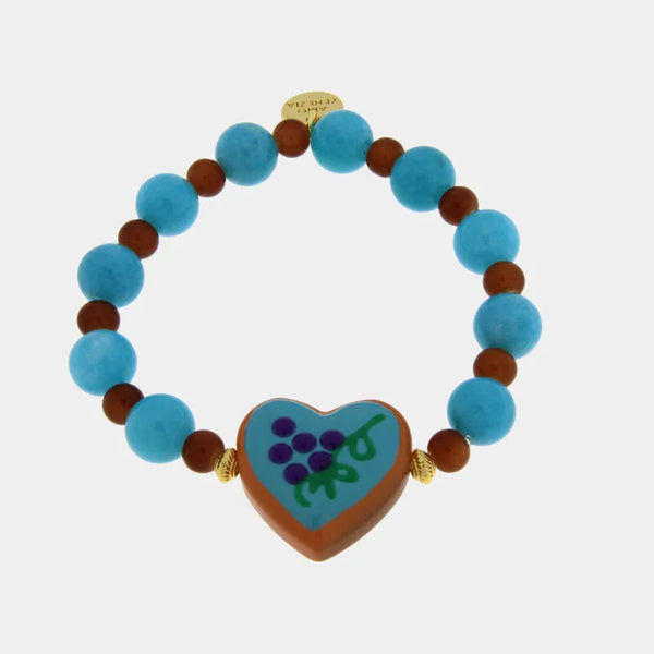 Bracciale in Metallo elastico con cuore turchese e perle rosse e azzurre — collezione golden murano